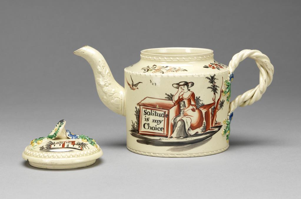 An image of Teapot and cover. Unidentified Yorkshire Pottery or Staffordshire Pottery, England. Painted in red and black enamels with a lady beside a tomb, inscribed 'Solitude/is my/Choice'. The cylindrical body has horizontal bands of rope-like rouletting round the base, shoulder and neck. The spout is moulded in relief with a sprays of foliage and with leaves round its junction with the body. Inside there are seven pierced holes to emit the tea. The two entwined double twist handles have flower and leaf terminals. The domed cover has a ventilation hole, and a band of rouletting round the edge. The applied knob is in the shape of a convolvulus flower with a small flower head and leaf terminal behind it, and a leaf with small flowers in front of it. One side of the pot is decorated in black and red with a bird flying towards a lady seated pensively beside a tomb on which are the words 'Solitude/is my/Choice' , On the other side there are Italianate buildings in a landscape with two trees. The shoulder has four sprays of stylized flowers and foliage. The termals of the handle are painted in blue, green, and yellow. The cover is decorated with similar buildings and schematic flying birds. The knob and its terminals are painted to match those on the handle. Dark cream-coloured earthenware, with applied handle and moulded spout, knob, and terminals, and rouletted borders, lead-glazed, and painted in blue, green, yellow, red and black enamels. Height, whole, 13 cm, length, whole, 19.7 cm, diameter, body, 10 cm, circa 1770-1775. Rococo. Sir Ivor and Lady Batchelor Bequest through the Art Fund.