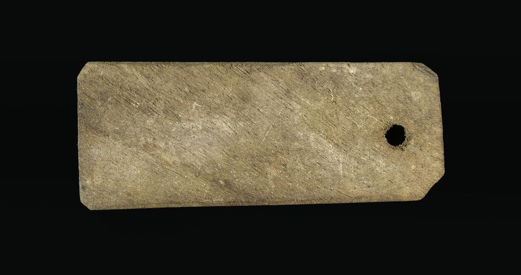 An image of Written document. Mummy label, Greek. Production Place: Egypt. Wood, length 0.113 m, width 0.044 m. Middle Roman Period. 101 - 200.