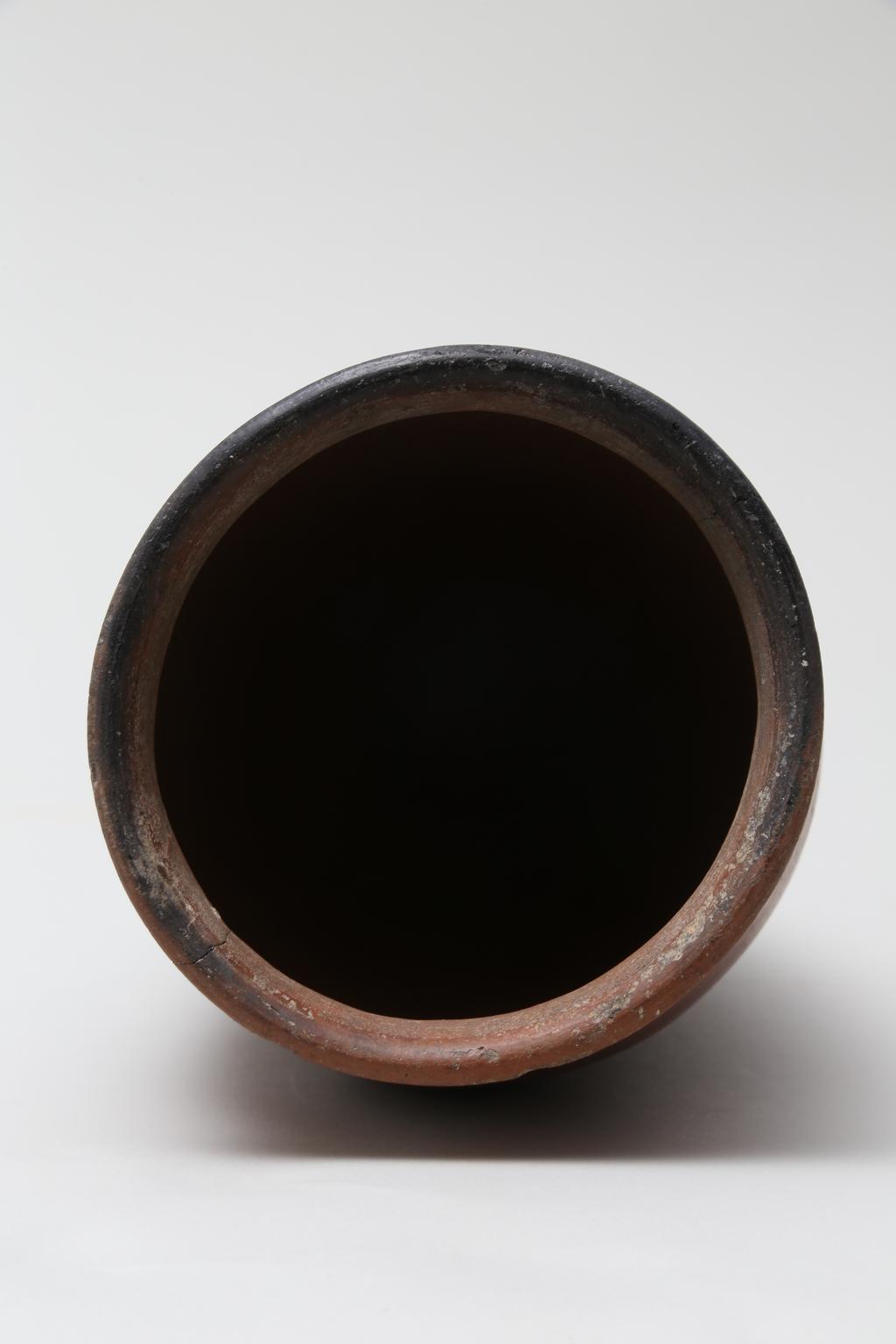 An image of Vessel. Jar, slender with black rim. Production Place/Find Spot: Egypt. Height 0.214 m, diameter, rim, 0.101 m, width, body, 0.112 m, c. 4500-3500 B.C. Nagada II & Predynastic period.