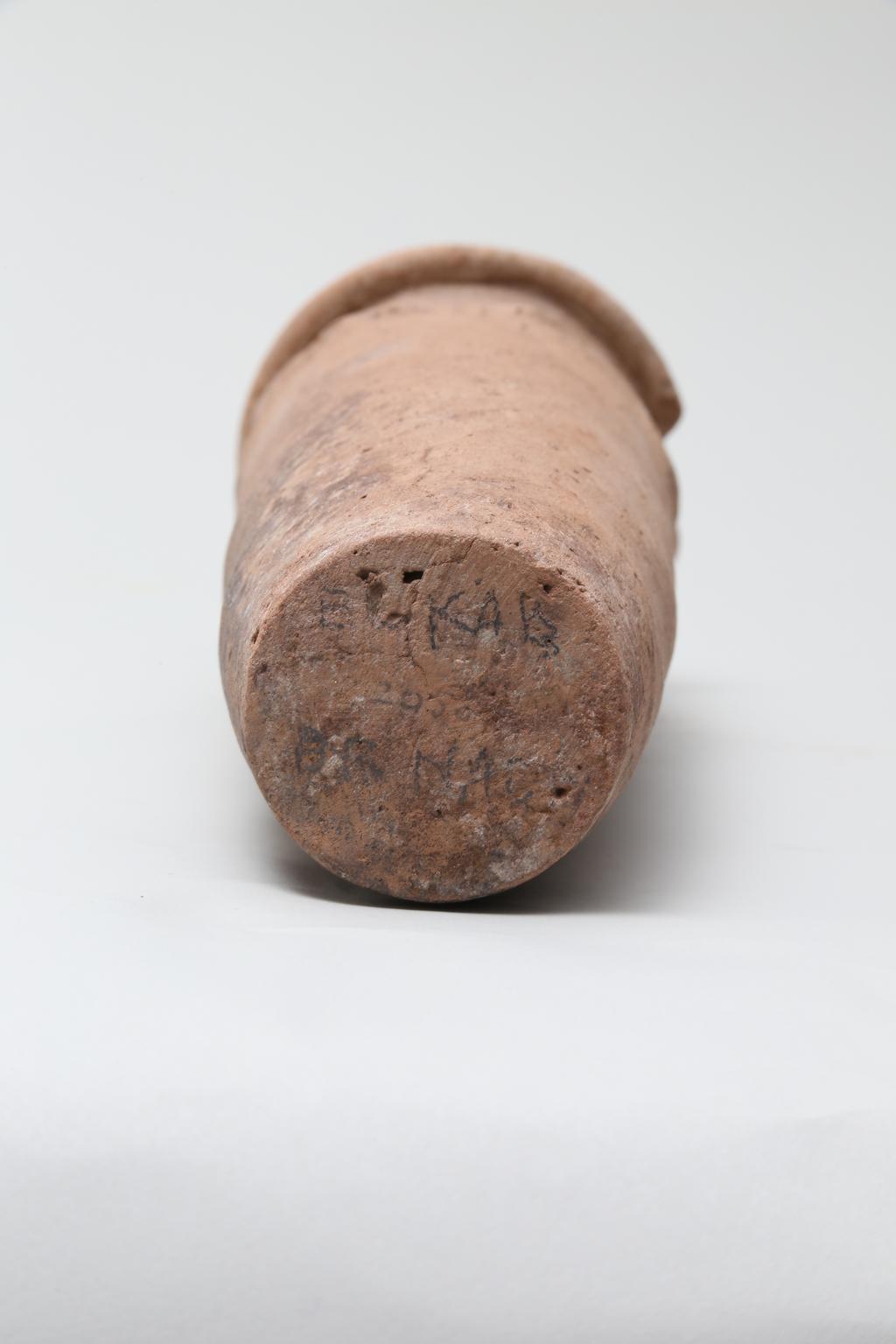 An image of Vessel. Jar, with wavy line decoration around shoulder. Production Place: Egypt. Find Spot: El Kab or Naqada, Egypt. Height 0.23 m. Predynastic Period.