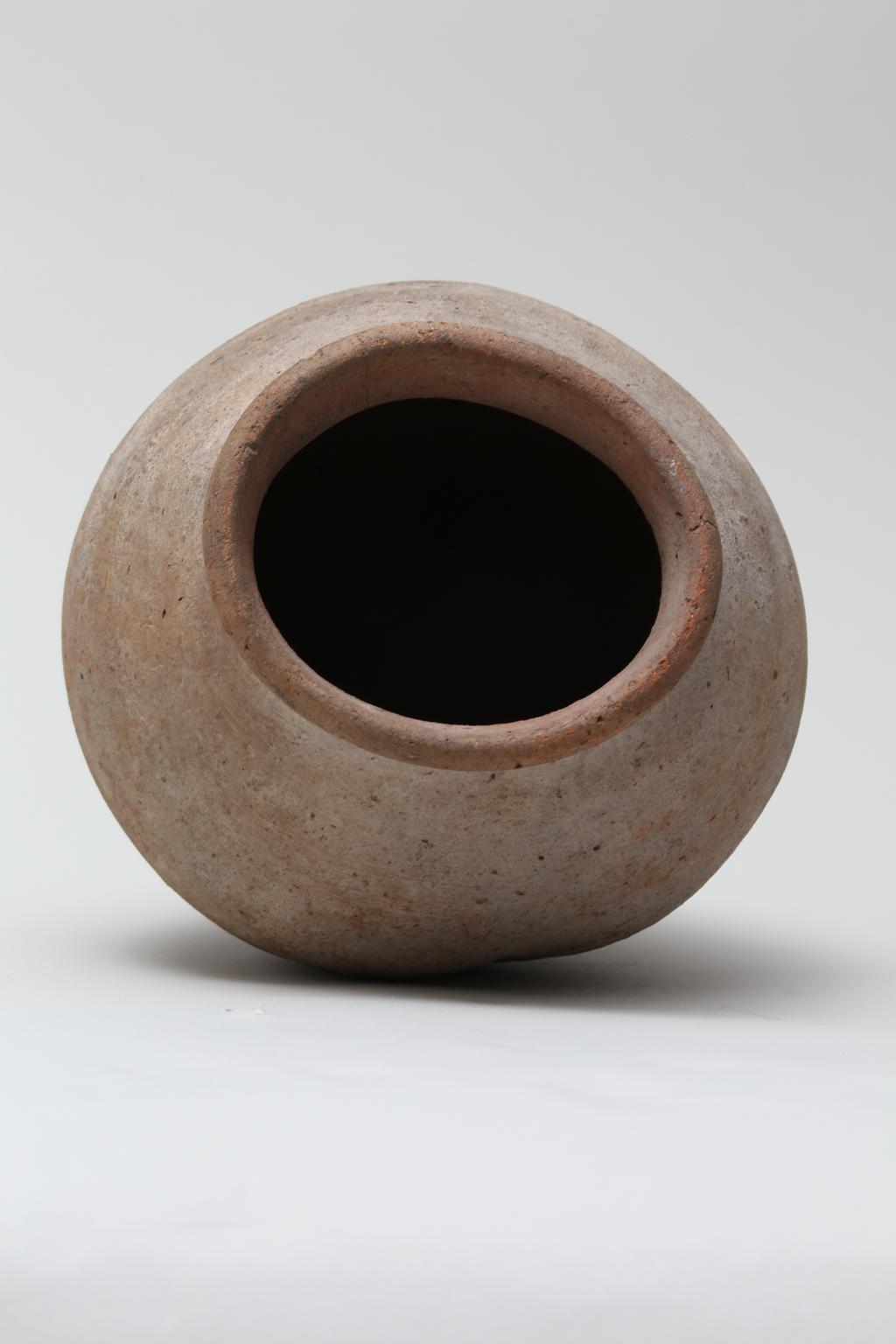 An image of Vessel. Jar, with rounded base. Production Place/Find Spot: Egypt. Height 0.2 m.
