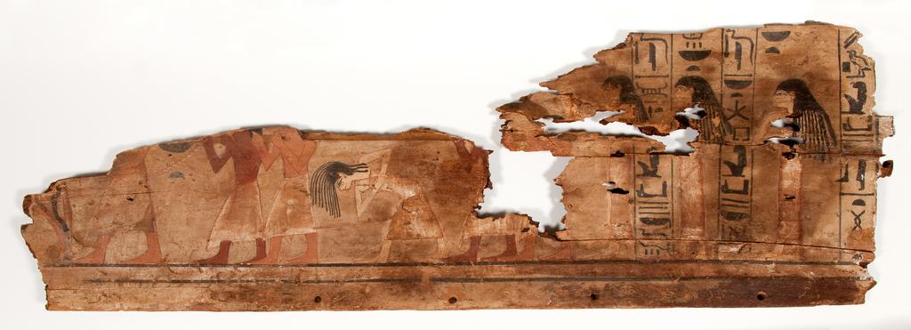 An image of Funerary Equipment. Coffin fragments, decorated. This coffin shows a procession of mourners, who consisted of friends, servants and family of the deceased. Unlike the Middle Kingdom eye coffins, where both eyes are shown on a single panel, this example only has one eye on each of the side panels. Production Place: Egypt, Find Spot: Arabah, el- Egypt. Wood, painted, height 39.3 cm, length 111.6 cm, 1580-1550 B.C. Previously attributed to Dynasty 13. Seventeenth Dynasty. Middle Kingdom.