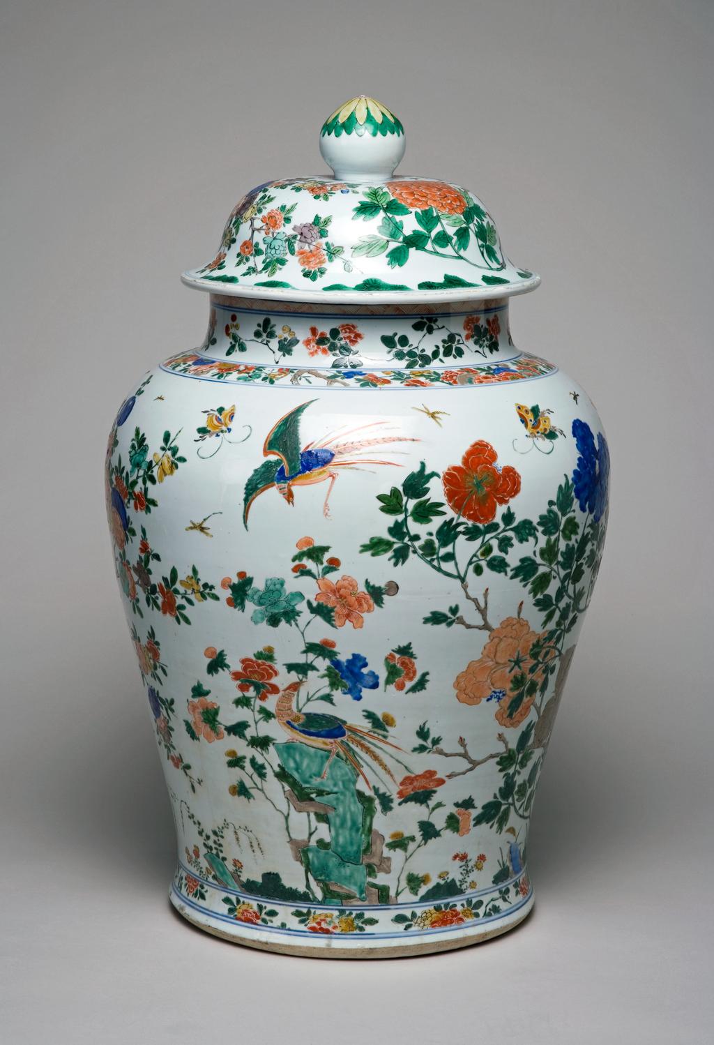 An image of Vase and Cover from a Garniture of Five Vases. Hard-paste porcelain, painted overglaze in enamels in the famille verte palette, and gilt, height 80 cm 1680-1720. Chinese. Kangxi Period (1662-1722). Qing Dynasty (1644-1912). Production Notes: Post-conservation.