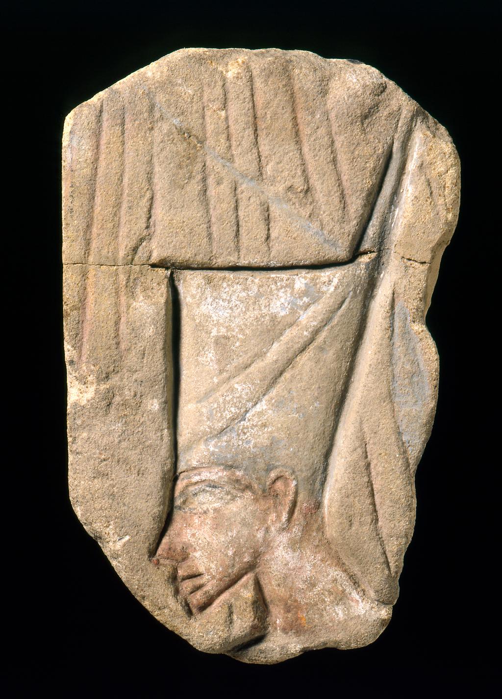 An image of Sandstone relief of Akhenaten
A human head wearing a crown, rays of the Aten behind the figure, fragment. Interpreted as the ruler Akhenaten wearing the crown of Lower Egypt.