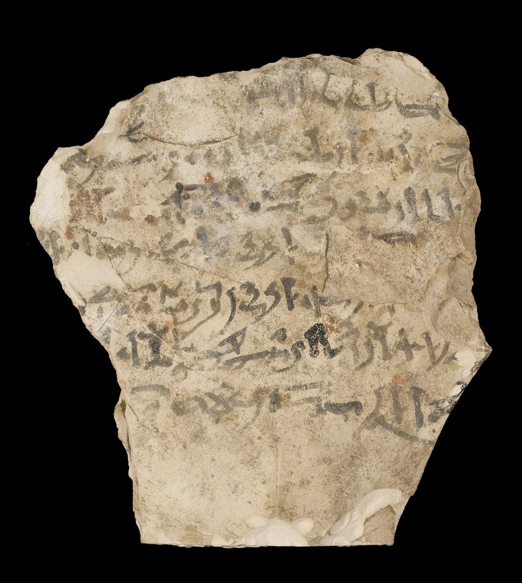 An image of Written Document. Ostracon, hieratic text, both sides, black and red ink. Production Place/Find Spot: Egypt. Limestone, length 0.161 m, width 0.143 m. New Kingdom.