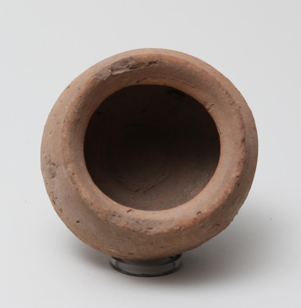 An image of Vessel. Jar, with rounded base, wide mouth. Production Place/Find Spot: Egypt. Height 0.085 m.