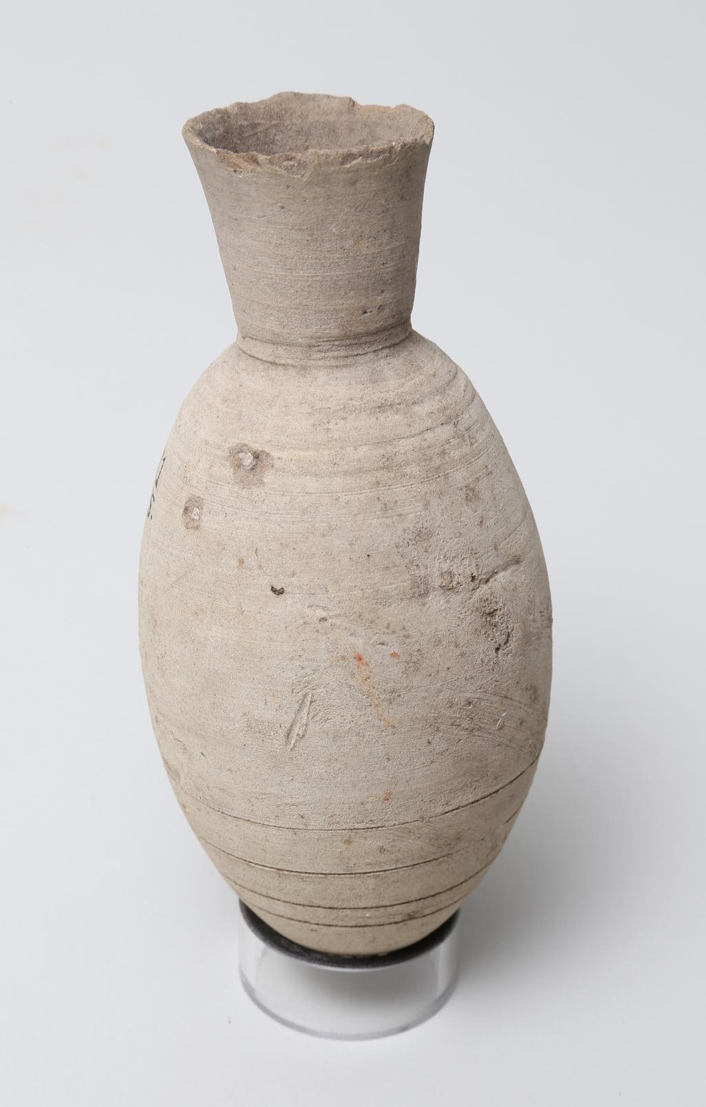 An image of Vessel. Jar, with pointed base. Production Place/Find Spot: Egypt. Height 0.145 m. Eighteenth Dynasty. New Kingdom.