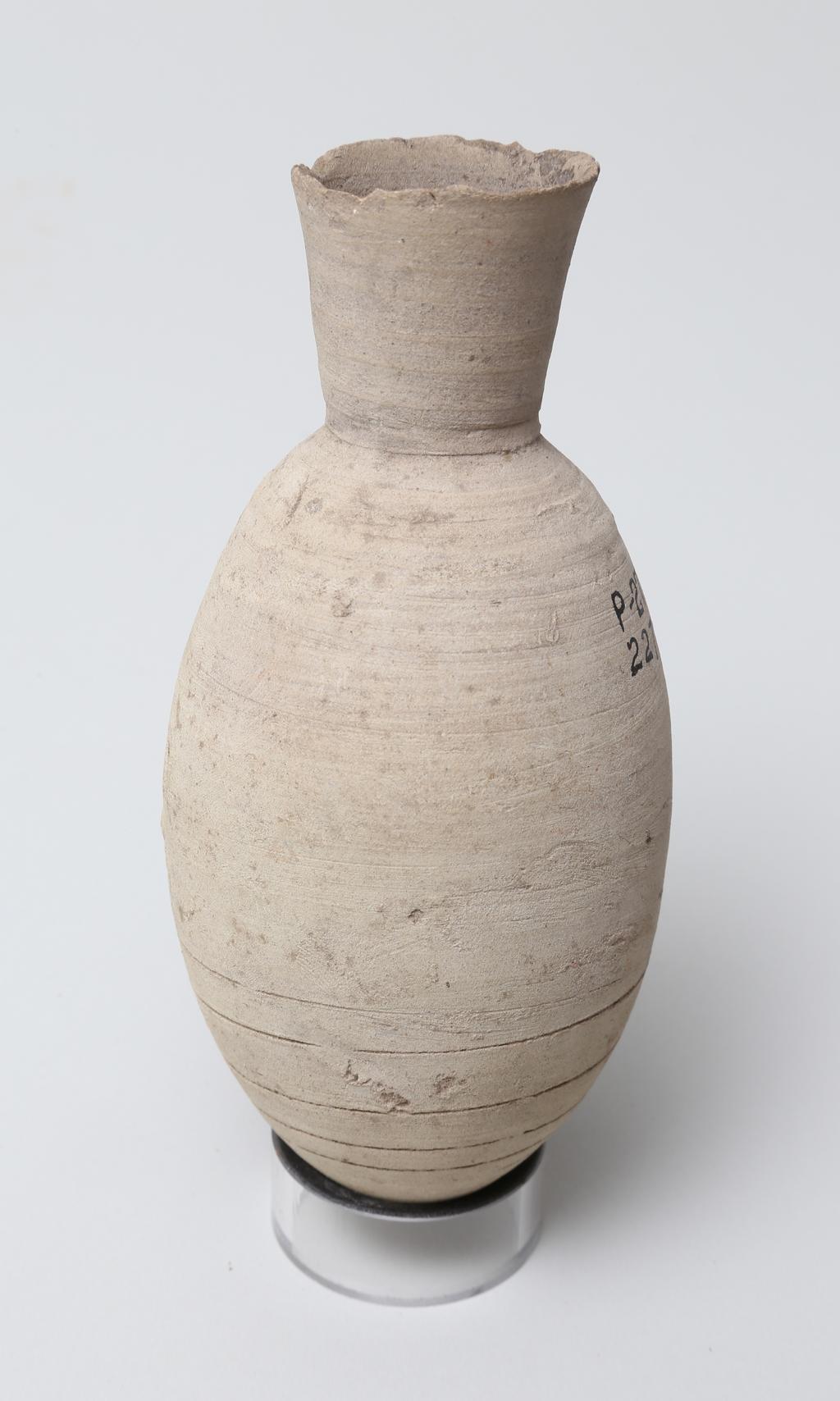 An image of Vessel. Jar, with pointed base. Production Place/Find Spot: Egypt. Height 0.145 m. Eighteenth Dynasty. New Kingdom.