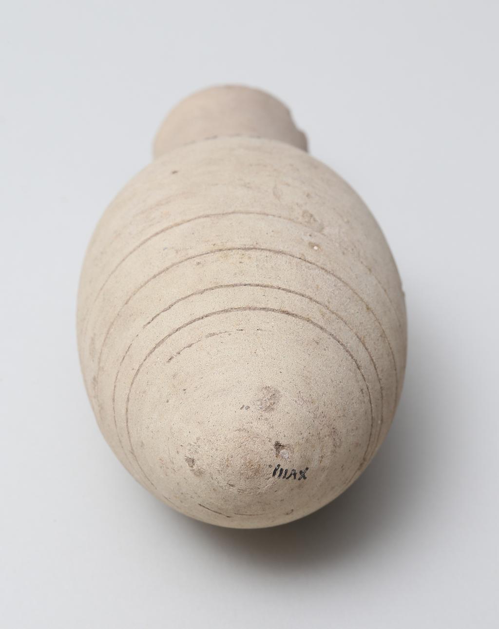 An image of Vessel. Jar, with pointed base. Production Place/Find Spot: Egypt. Height 0.145 m. Eighteenth Dynasty. New Kingdom.