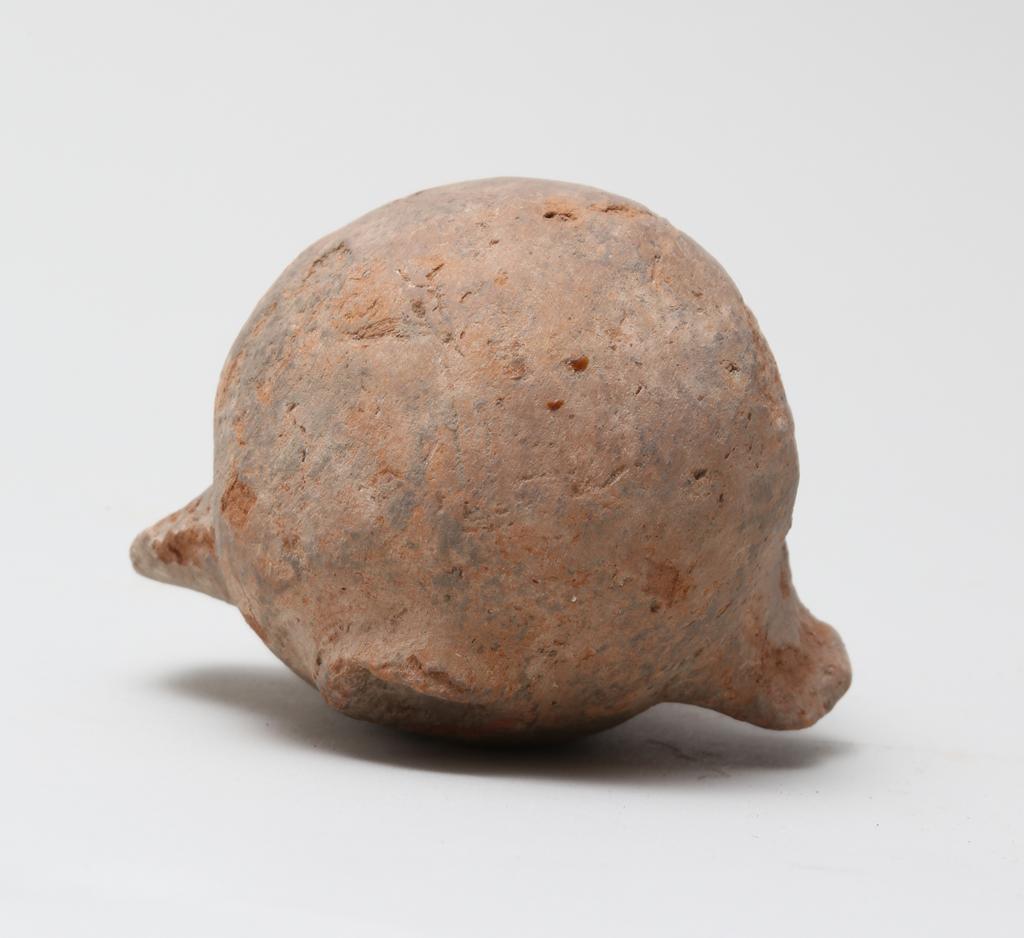 An image of Vessel. Jar, in the form of a bird ?, head missing. Find Spot: Naukratis?, Egypt. Production Place: Egypt. Height 0.105 m.