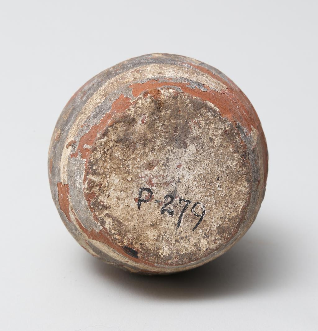 An image of Vessel. Jar, with decoration in black and red paint. Find Spot: Abydos?, Egypt. Production Place: Egypt. Height 0.065 m.