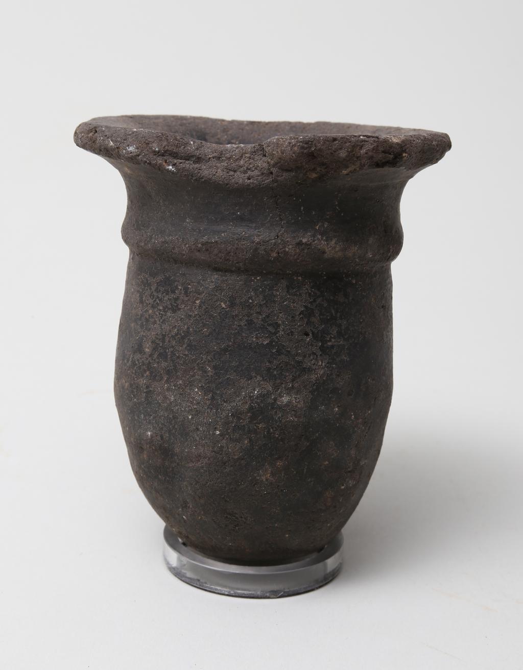 An image of Vessel. Jar, with rounded base. Production Place/Find Spot: Egypt. Height 0.09 m.