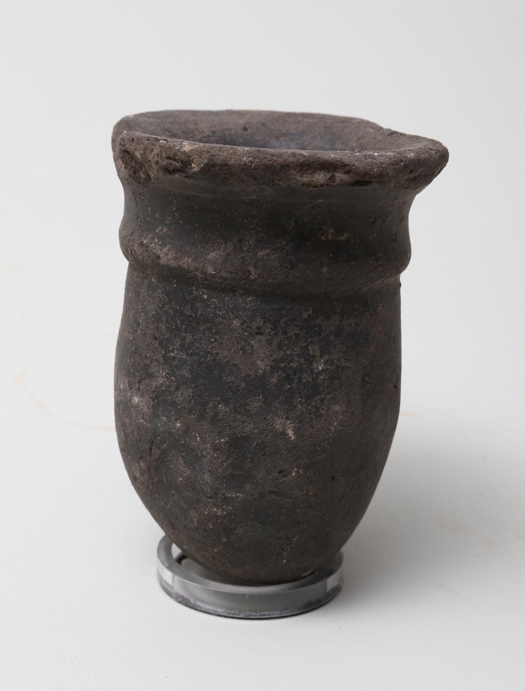 An image of Vessel. Jar, with rounded base. Production Place/Find Spot: Egypt. Height 0.09 m.