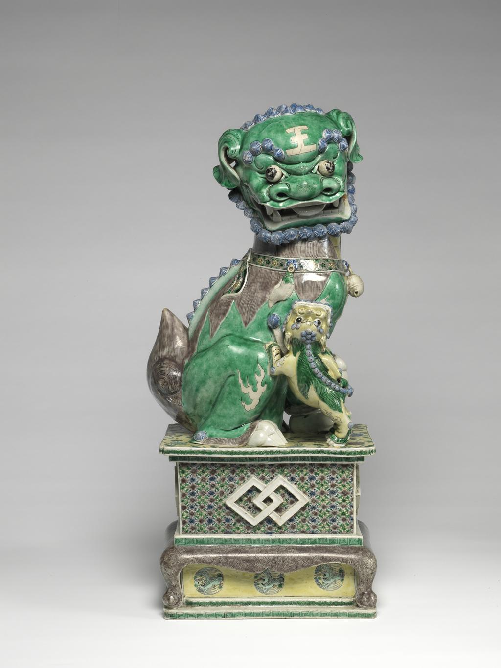 An image of Animal figure. Dog of Fo (one of a pair). Unknown maker, China. Hard-paste porcelain, enamelled on biscuit, height 52 cm, width 21 cm, 1662-1722. Kangxi Period.