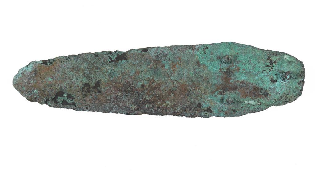 An image of Weapons. Dagger. Find Spot: Tamassos, Cyprus. Bronze, length 0.13 m, width 0.034 m, 2100-1201 B.C. Early Cypriot II - Late Cypriot II. Bronze Age.