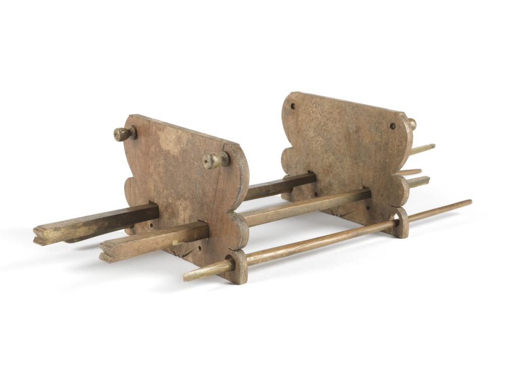 An image of Stand, or device for scrolling papyrus. Production Place: Italy, possibly. Ivory, carved, AD 1-100. Early Roman.