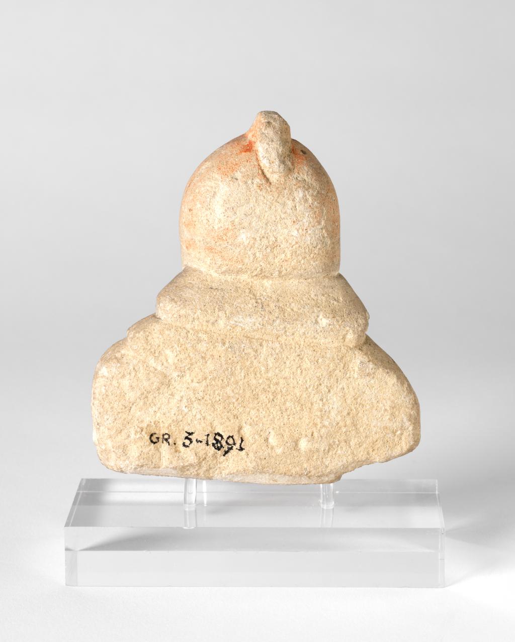An image of Figure/statuette. Man, wearing cap. Production Place: Cyprus. Find Spot: Salamis, Cyprus. Limestone, height 0.09 m, 600-501 B.C. Archaic Period.