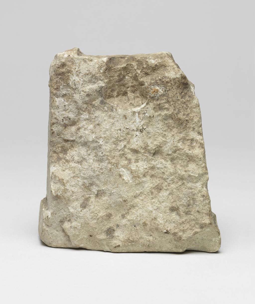 An image of Religious/ritual equipment. Altar with inscription, which may be transcribed 'ni-ko-se-ka-? -wo-se / a-ne-te-ke-i-tu-ka-i' and may be translated 'Nikos son of Karus(?) set this up for luck'. Find Spot: Tamassos. Cyprus. Limestone, depth, 0.072 m, height, 0.127 m, width, 0.11 m, 500-301 B.C. Classical Period.