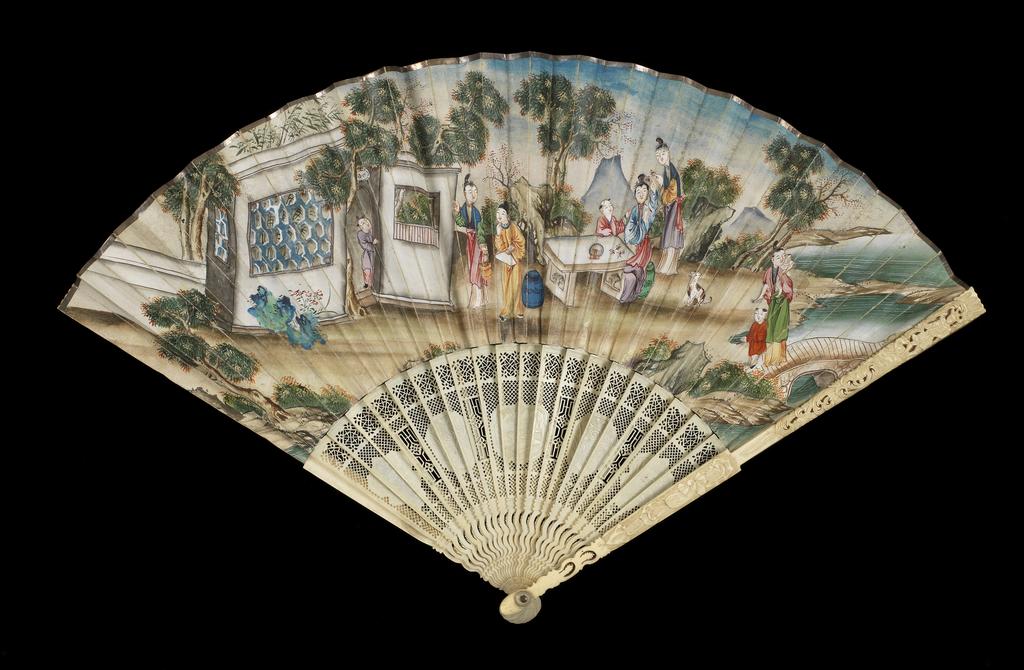An image of Folding fan of double paper, painted in colours with a Chinese genre scene in a landscape. Sticks and guards of pierced ivory. Length, guard, 26.9 cm, 1770-1790. Chinese, possibly. Messel-Rosse Collection.