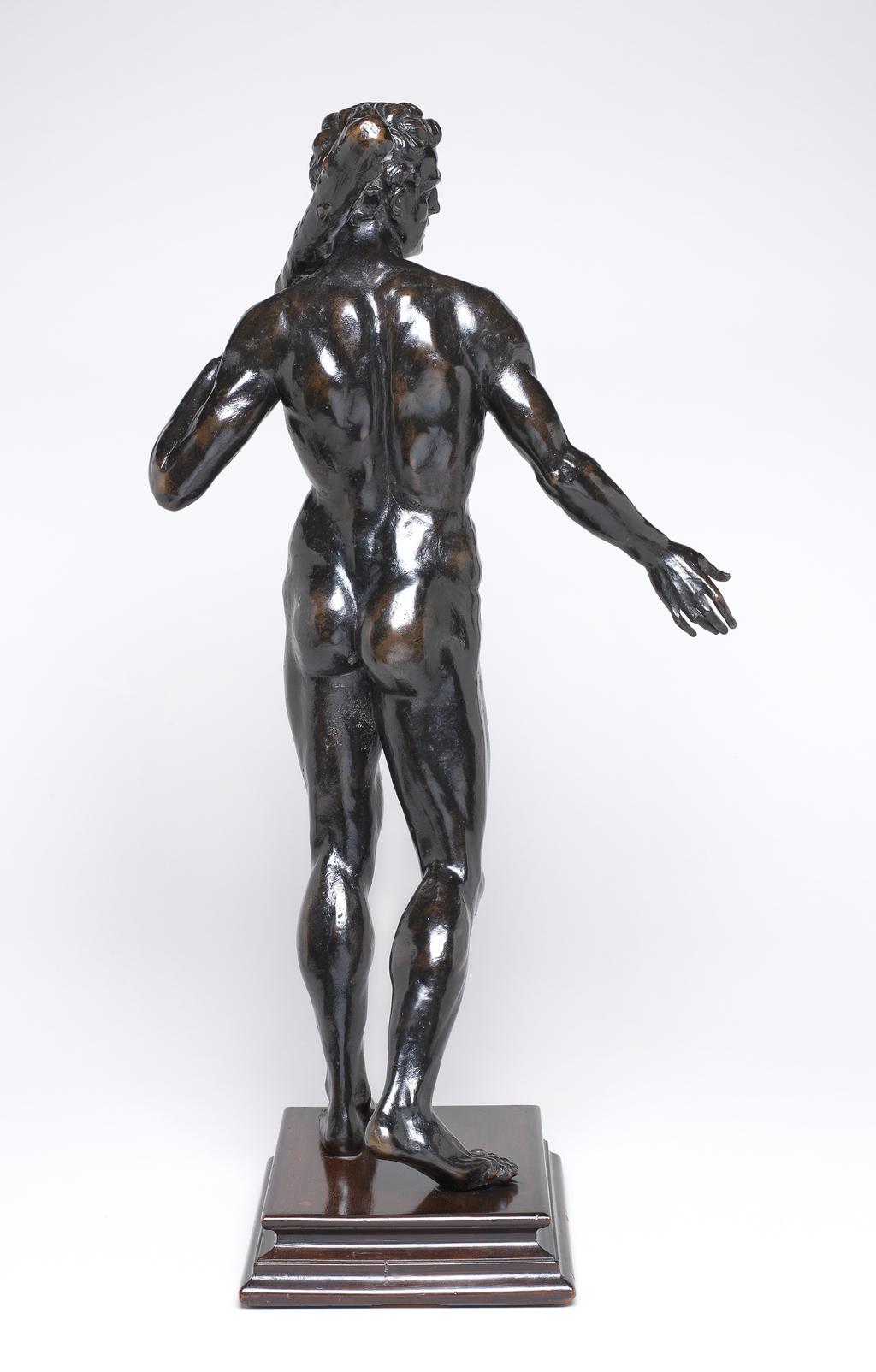 An image of Sculpture/Figure. Hercules. The nude male figure stands with the weight of the body on the left foot, holding a club over the left shoulder with his left hand and his right arm and the open palm of his right hand make a gesture of despair (?). Bronze, cast, patinated and polished, height, whole, 58.8 cm, circa 1700-1800. Production Note: Probably an Academy drawing model.