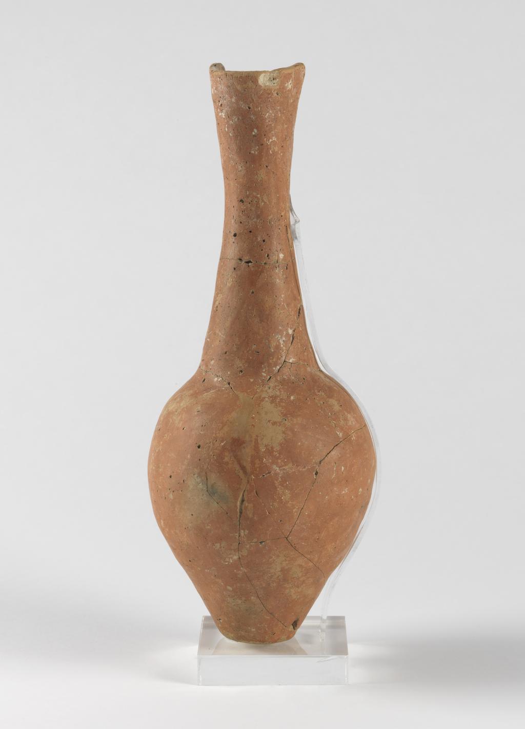 An image of Vessel. tall-necked jug. Production Place: Cyprus. Find Spot: Vounous Cyprus; Tomb 153. Clay, height 0.382 m, width 0.144 m, 2400 to 2201 B.C. Early Cypriot I. Bronze Age.