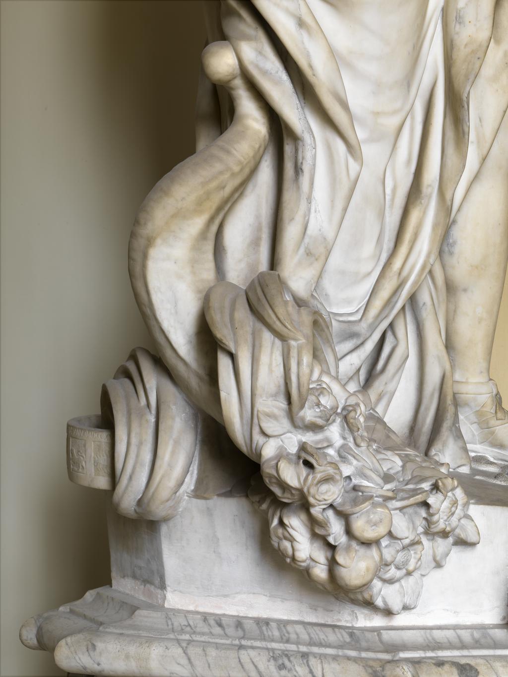 An image of BARATTA, Giovanni (the Younger)GloryCarrara white marble, carved in the round; on grey veined marble pedestal, with black marble cartouche. A full length figure of a woman, representing 'Glory' supported on a high pedestal.The inscription on the black marble is not the original as devised by James Brydges, first Duke of Chandos (1784-1744) which read: GLORIA MARLBURI, LAURO TUA TEMPORA CINGIT/DIVA LUBENS QUORSIUM? PAR DECUS INDE REFERT.C.1715Florence, Italy