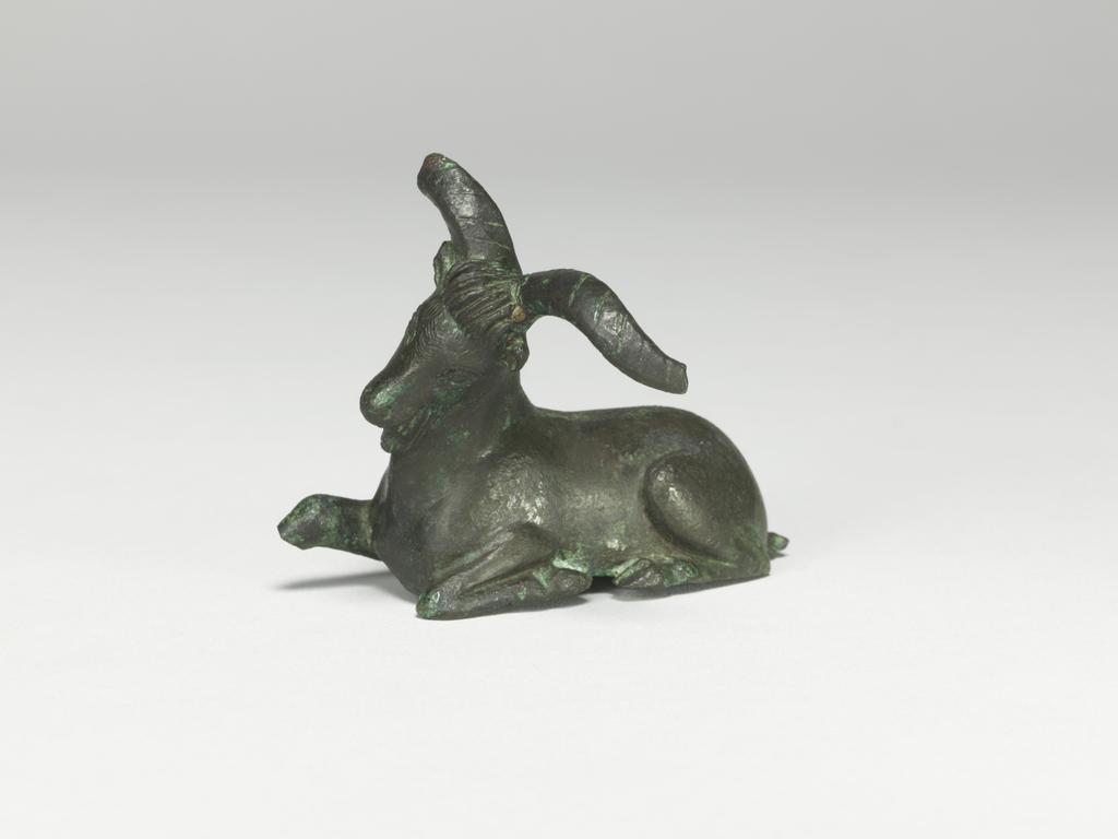 An image of Figure/Statuette. Goat. Production Place: Corinth, possibly. Bronze, height 0.047 m, width, 0.061 m, depth 0.048 m, maximum, 500-401 B.C. Classical Period.