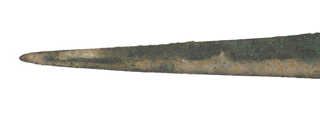 An image of Weapons. Sword. Production Place: Cyprus. Bronze, length 0.289 m, width 0.029 m, 1400-1201 B.C. Late Cypriot II, Bronze Age.