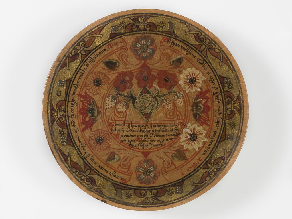 An image of Woodwork. Box of roundells. Box containing twelve trenchers. Wood, painted, gold decoration, height, box, 3.2 cm, diameter, box, 16.6 cm, diameter, roundels, 13.2 cm, circa 1600. Renaissance. Elizabeth I. English.