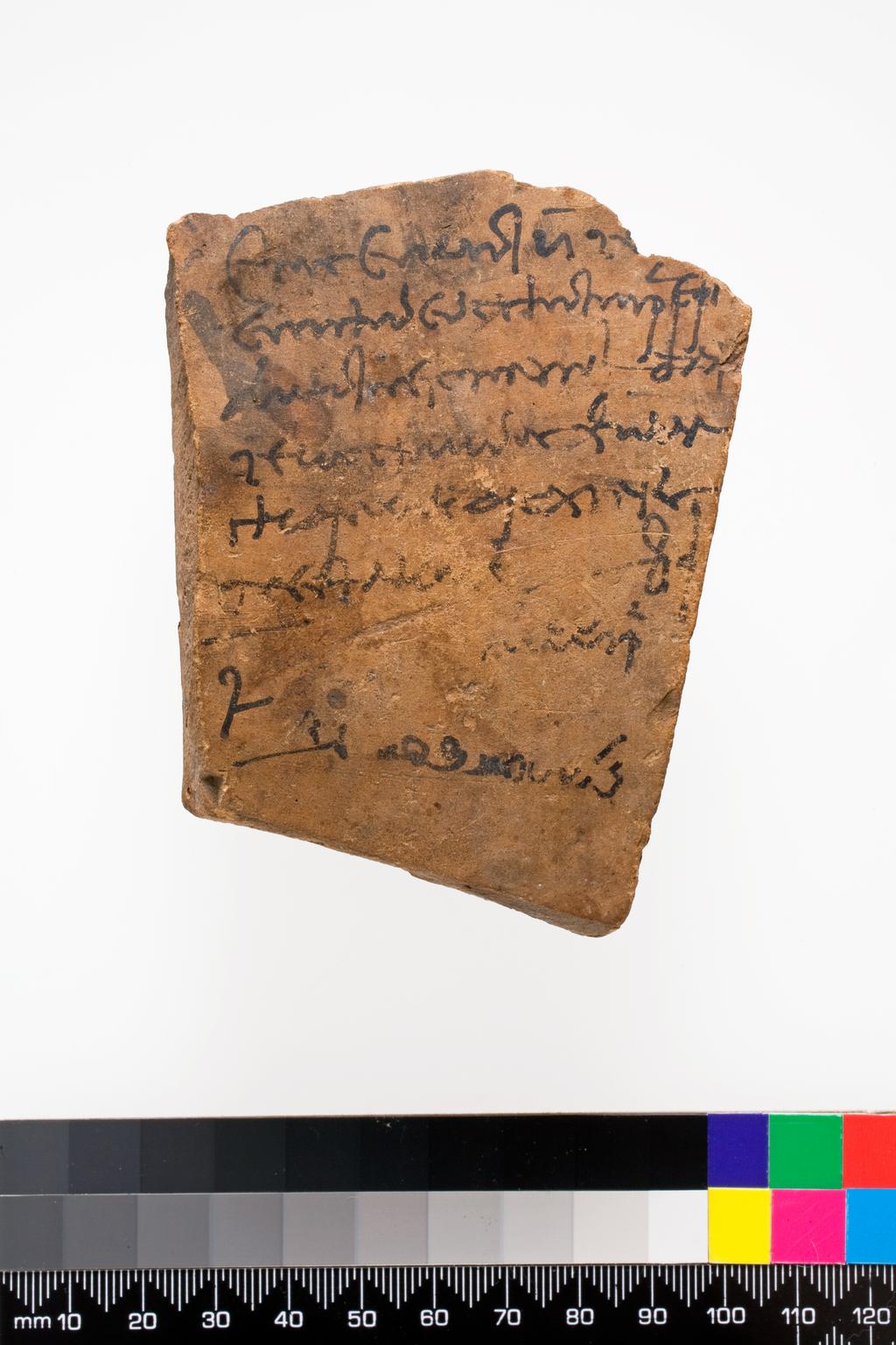 An image of Written Document. Ostracon, in Greek (6 lines), with one line of demotic for Djedhor, son of Simon. Production Place: Egypt, Aswan. Clay. Ptolemaic Period.