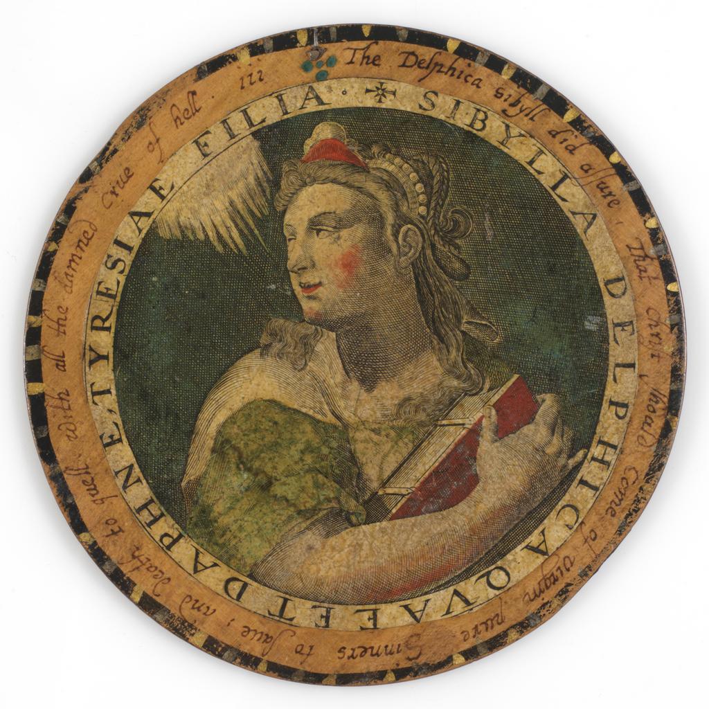 An image of Roundel or trencher. One of twelve wooden roundels, with an applied print of the Delphic Sibyl. Hand-coloured in red, green, ochre and black. Inscribed in black ink. Undecorated reverse. With a small hole near the top at the edge, diameter 13.7 cm, circa 1601-1625. Part of M.5.1-13 & A-1920: Box containing twelve roundels or trenchers. Unknown maker, after Passe, Crispijn I de, printmaker (Flemish, 1564-1637). Circular box and cover of turned wood, containing twelve roundels. Each decorated with an applied hand-coloured engraving of a Sibyl, surrounded by a hand-written English inscription. Height, box, 6.7 cm, diameter, box, 17.1 cm, diameter, roundels, 13.7 cm, circa 1601 to circa 1625.