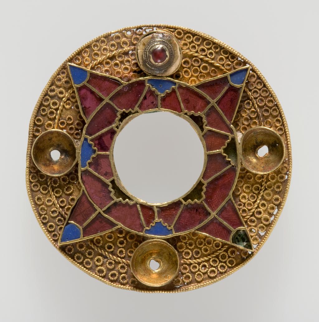 An image of Jewellery/Bracteate. Gold, decorated with a concentric design of stamped chequered triangles, height 3.2cm, depth 2.8cm, circa 500-600. Anglo-Saxon. From 19th century excavations of a cemetery at the King's Field, Faversham, Kent.