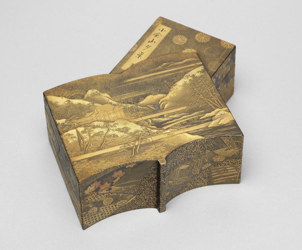 An image of Box, lid and tray. Unknown maker, Japan. Box in the shape of two intersecting books, one open and one closed with a seated lid (A) and containing a tray (B). The open book is decorated in gold and silver-grey hiramakie (low-relief sprinkled design) and takamakie (high-relief sprinkled design) and togidashi (brought out by polishing) with a mountainous landscape, trees, a waterfall, a bridge spanning a river and a pavilion on a black and gold powdered ground. The closed book is decorated in togidashi with gold flower heads on a black and gold powdered ground, with gold bindings and the title in a gold rectangular panel. The title reads `A View of Konensan `, the last character meaning 'complete in one volume.' The sides are finely decorated with intricate brocades of flower heads, leaves, ducks, fans and diaper patterns in gold, red and silver-grey on a black nashiji (shimmering spangles) ground. The tray is finely decorated in gold, red and silver-grey with sprays of autumn flowers and foliage on a black and gold powdered ground with a gold rim. The base of the tray is nashiji.The inside and the base are nashiji. Lacquer, decorated in hiramakie (low-relief sprinkled design), takamakie (high-relief sprinkled design), togidashi (brought out by polishing) and nashiji, height, whole, 4.0 cm, width, whole, 11.0 cm, length, whole, 11.8 cm, circa 1700-1868. Edo (1615-1868). Acquisition: