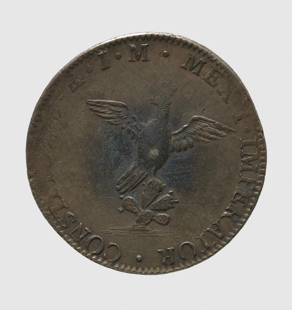 An image of Coinage. 8 reales. Augustín I (1822-1823), ruler. Mexico City mint. Empire of Iturbide, subsubseries. Silver, milled, diameter 40 mm, 1822. Acquisition: On loan from Queens' College Cambridge.