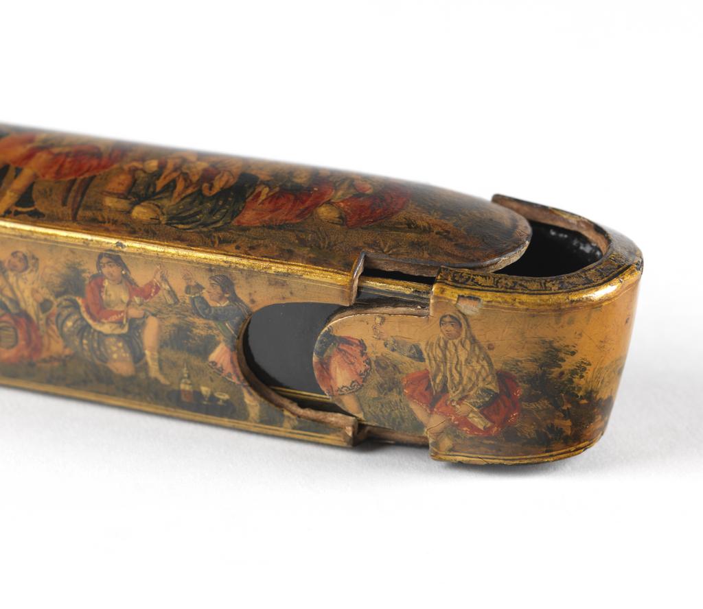 An image of Pen case/box. Unknown maker, Iran. Pen case, of lacquered and gilt wood, decorated on the top and sides with a young couple, attendant ladies and entertainers out-of-doors. Circa 1800-circa 1975. Qajar Period. Collection: Henry Scipio Reitlinger.