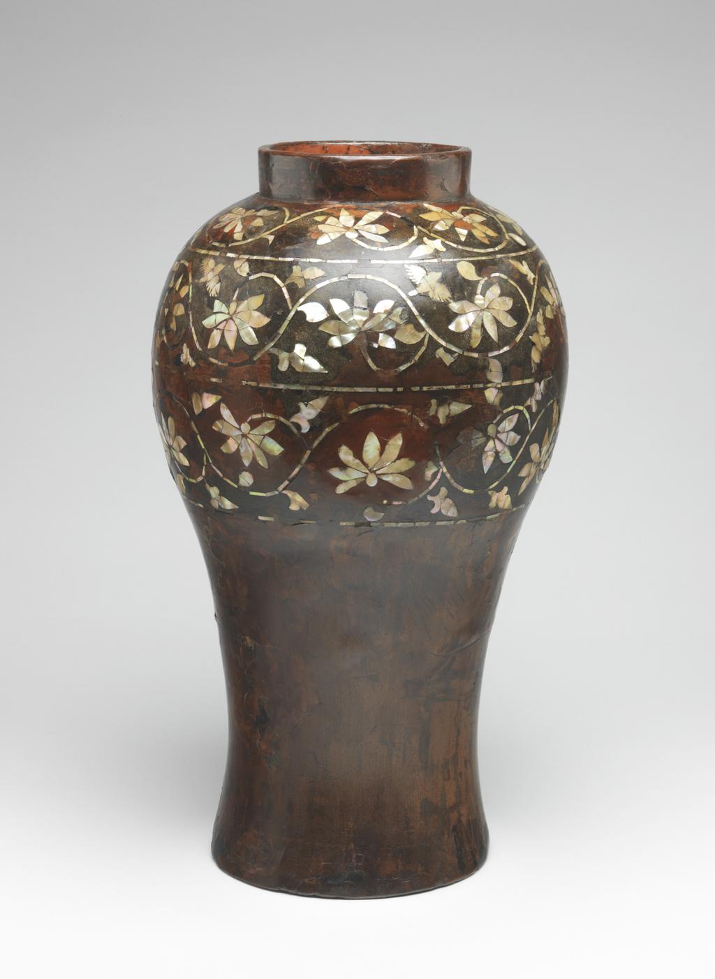 An image of Jar of Maebyeong Shape. Lacquer on wooden core, inlaid with mother of pearl, height 35.8 cm, diameter (rim) 10.2 cm, diameter (foot) 14.0 cm, circa 1600-1800. Choson Dynasty. Korean.
