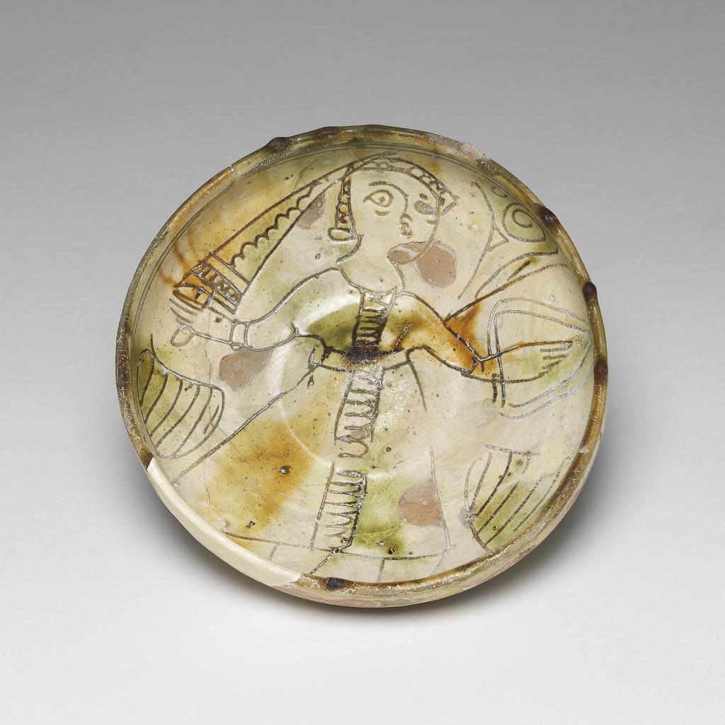 An image of Bowl. Unknown maker, Cyprus. Earthenware, coated with white slip. With decoration scratched through it under a polychrome coloured glaze, 1400-1599.