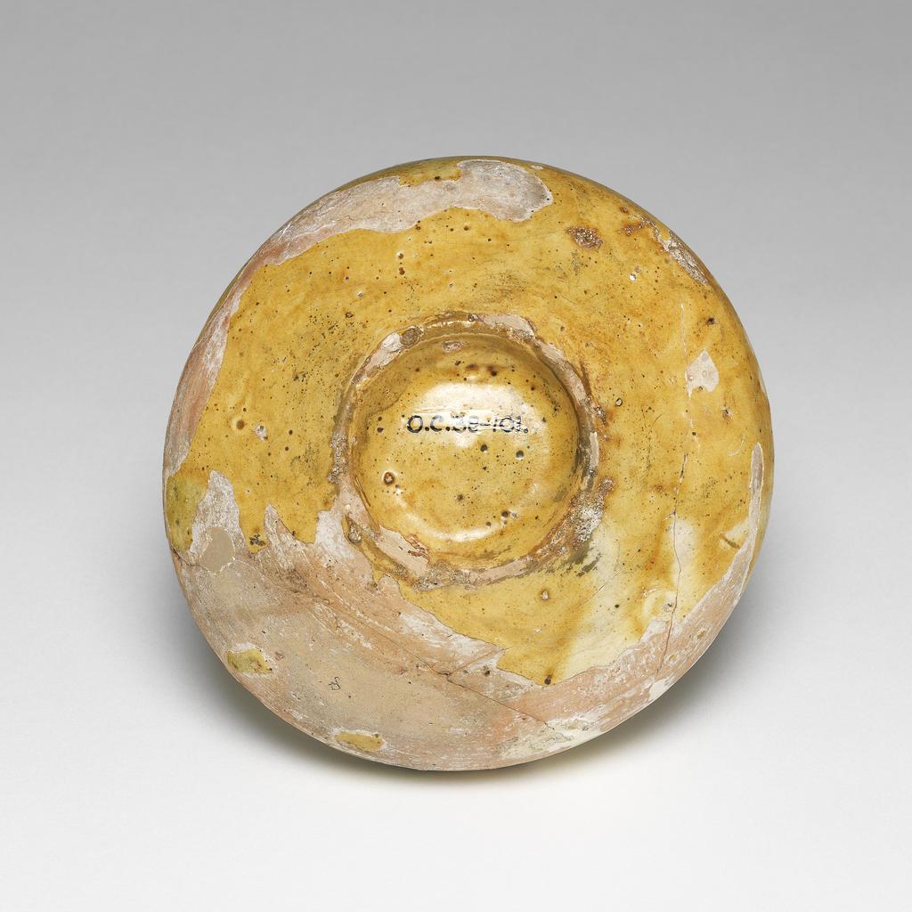 An image of Bowl. Unknown maker, Cyprus. Earthenware, coated with white slip. With decoration scratched through it under a polychrome coloured glaze, 1400-1599.