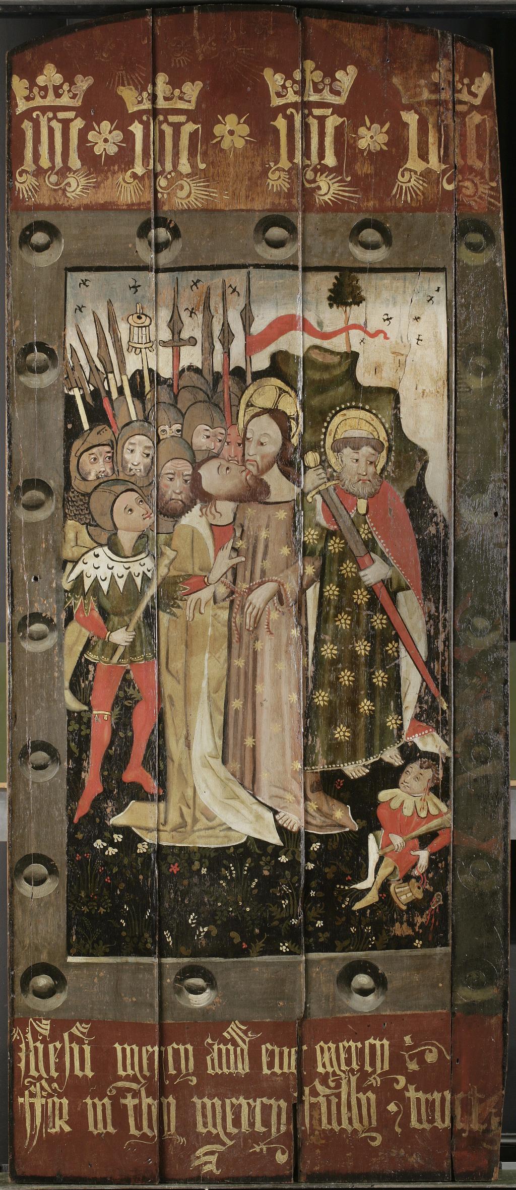 An image of The Kiss of Judas. British School, Coventry? Oil on oak boards, height 173 cm, width 74.3 cm, c 1470. Inscription; u.c.; painted; IHC; holy monogram, repeated four times. Inscription; l.c.; painted; Jhesu mercy and eue[r] mercy Ffor in thy mercy fully trust. Notes: HKI-2426.