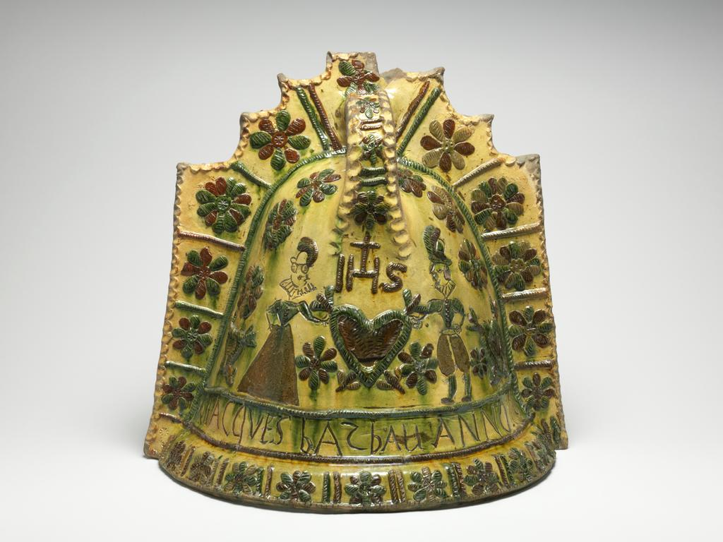 An image of Fire Cover/couvre feu. Lead-glazed earthenware. Production Place: Sorrus, France. Incised, ‘JACQVES BATBAU ANNO 1616’.