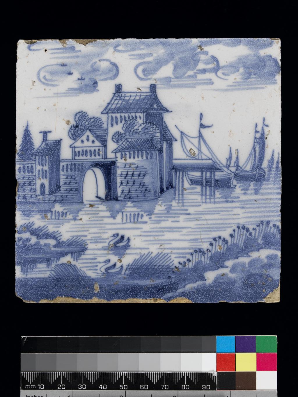 An image of Description: Earthenware, tin-glazed white on the upper surface and painted in blue. Buildings, a bridge and a jetty beside water with two swans in the foreground and shipping in the background to right.Dimensions: height: (whole): 12.9 cm, width: (whole): 12.9 cmDate: circa 1700 to 1800   