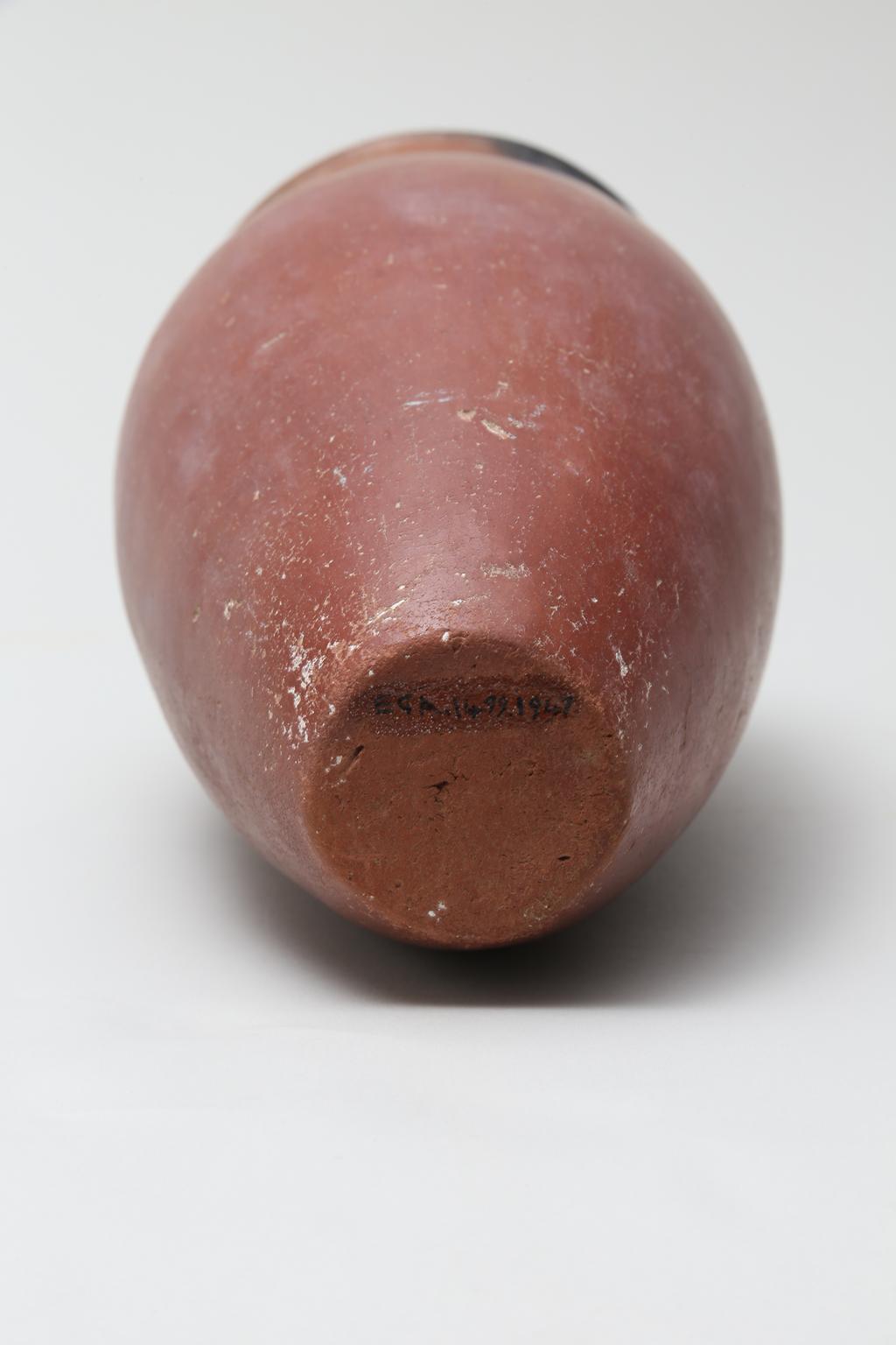 An image of Vessel. Jar, slender with black rim. Production Place/Find Spot: Egypt. Height 0.214 m, diameter, rim, 0.101 m, width, body, 0.112 m, c. 4500-3500 B.C. Nagada II & Predynastic period.