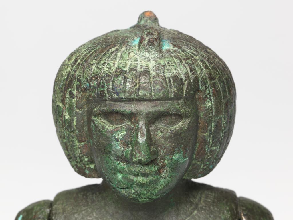 An image of Figure/Statuette. Production Place: Egypt. The prominent pubic triangle suggests that the figure was associated with fertility. Such representations were found in graves as early as the Middle Kingdom; during the earlier periods such objects were typically made from wood, clay, ivory or bone. A connection to fertility would explain why the subject is naked- this is extremely rare in Egyptian art. This figure has moveable arms, inlaid eyes (now missing) and once wore a headdress or crown, as indicated by the tenon on top of the head. The short wig identifies the subject as Nubian (southern Egypt or Sudan) and the rounded, broad face suggests that the female was African. The figure was hollow cast in several pieces and is in good condition. Copper alloy, body cast hollow in one piece, arms cast separately, obsidian pubic triangle inlay, height 21.8 cm, circa 747- circa 656 B.C. Twenty-fifth Dynasty.