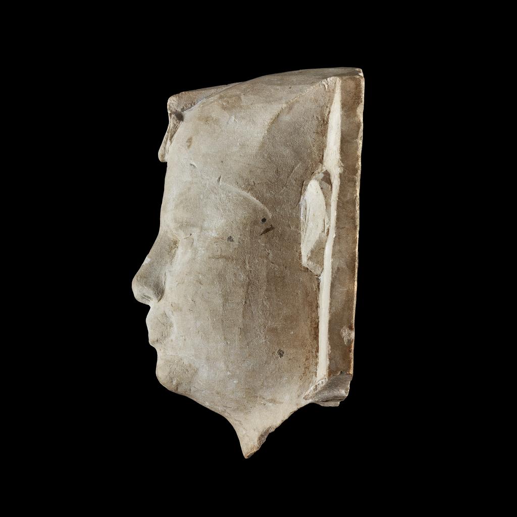 An image of Figure/Statue. A Sculptor's Model. King's head, wearing nemes and uraeus (cobra), broken off at neck, roughly finished surface. Production Place/Find Spot: Egypt. Limestone, carved. Late Period-Ptolemaic. Production Note: Rulers of Dynasty 30 and the Ptolemaic period used this 'portrait type'. The continuation was probably a deliberate attempt to associate the new Greek rulers with the last Egyptian dynasty.