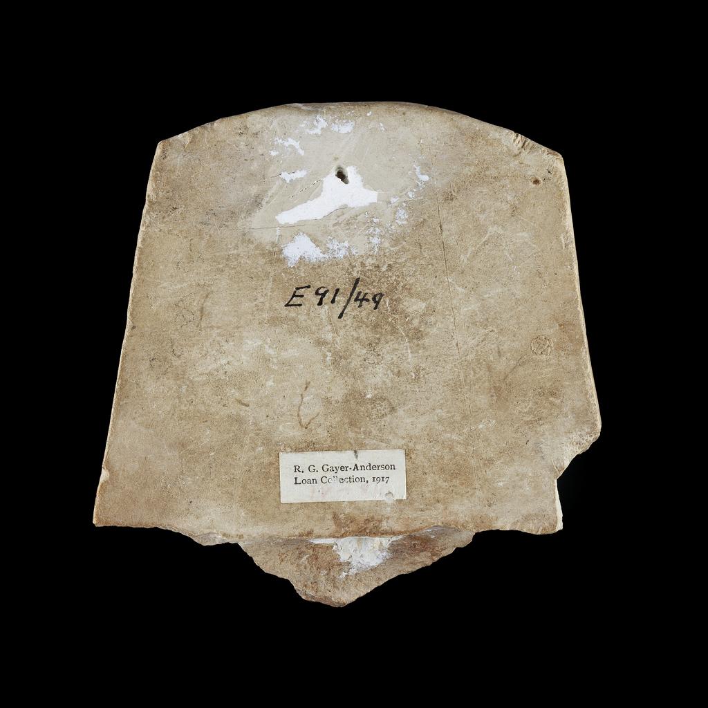 An image of Figure/Statue. A Sculptor's Model. King's head, wearing nemes and uraeus (cobra), broken off at neck, roughly finished surface. Production Place/Find Spot: Egypt. Limestone, carved. Late Period-Ptolemaic. Production Note: Rulers of Dynasty 30 and the Ptolemaic period used this 'portrait type'. The continuation was probably a deliberate attempt to associate the new Greek rulers with the last Egyptian dynasty.