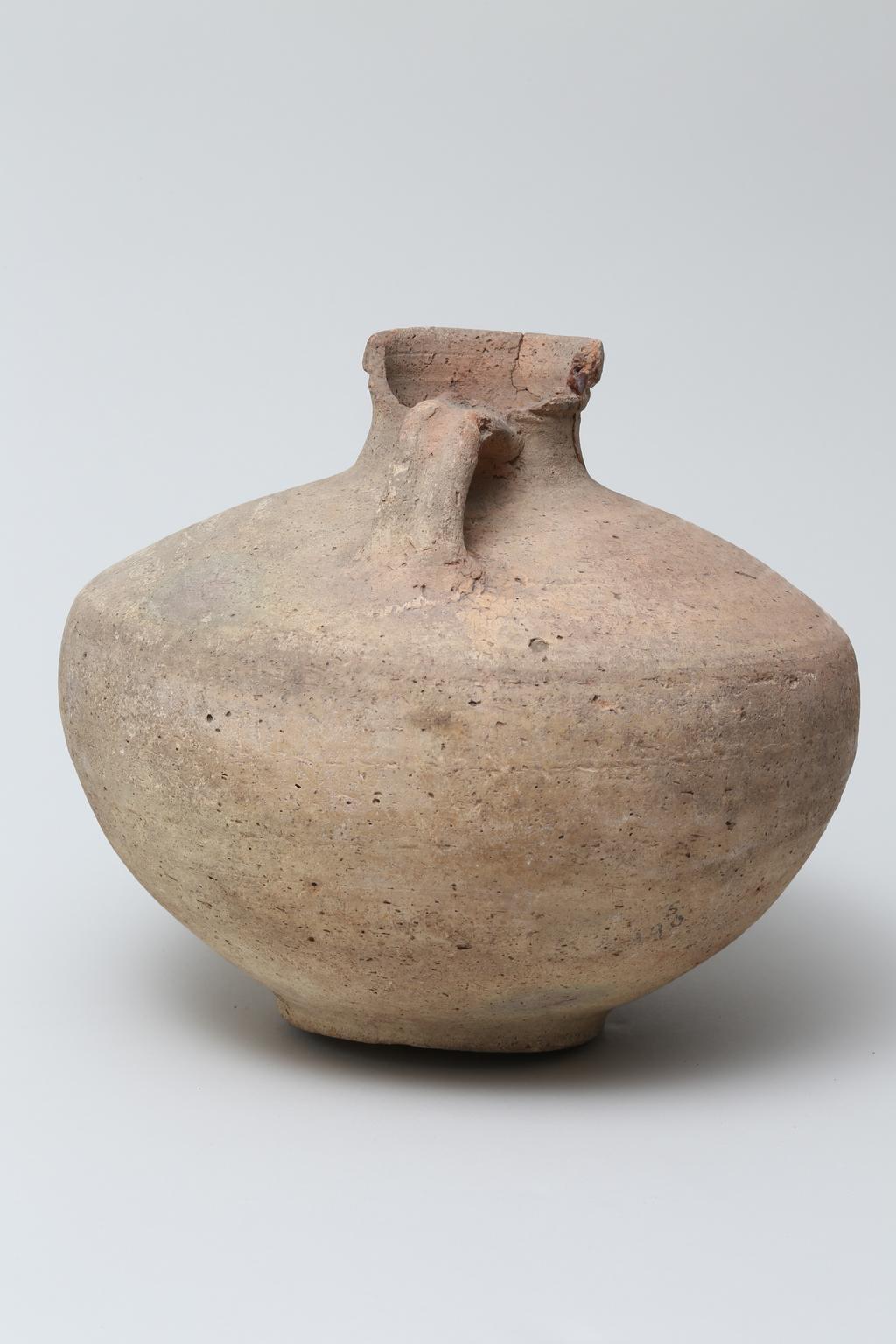 An image of Vessel. Jar, broad shouldered, with two handles attached to shoulder and neck. Production Place/Find Spot: Egypt. Height 0.2 m.