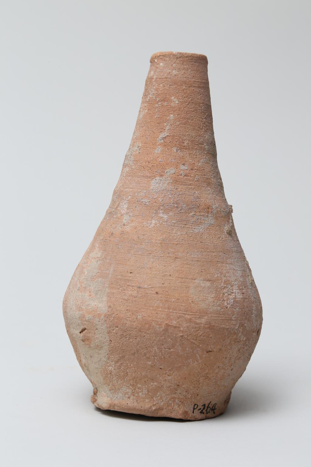 An image of Vessel. Jar, with long thin neck, bottle shape. Production Place/Find Spot: Egypt. Height 0.1575 m.