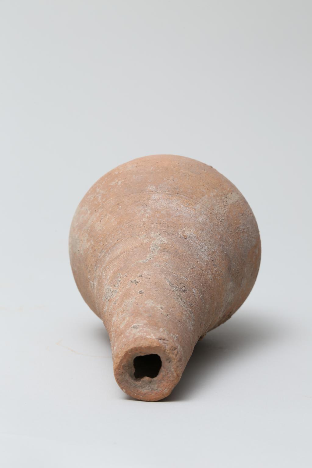 An image of Vessel. Jar, with long thin neck, bottle shape. Production Place/Find Spot: Egypt. Height 0.1575 m.