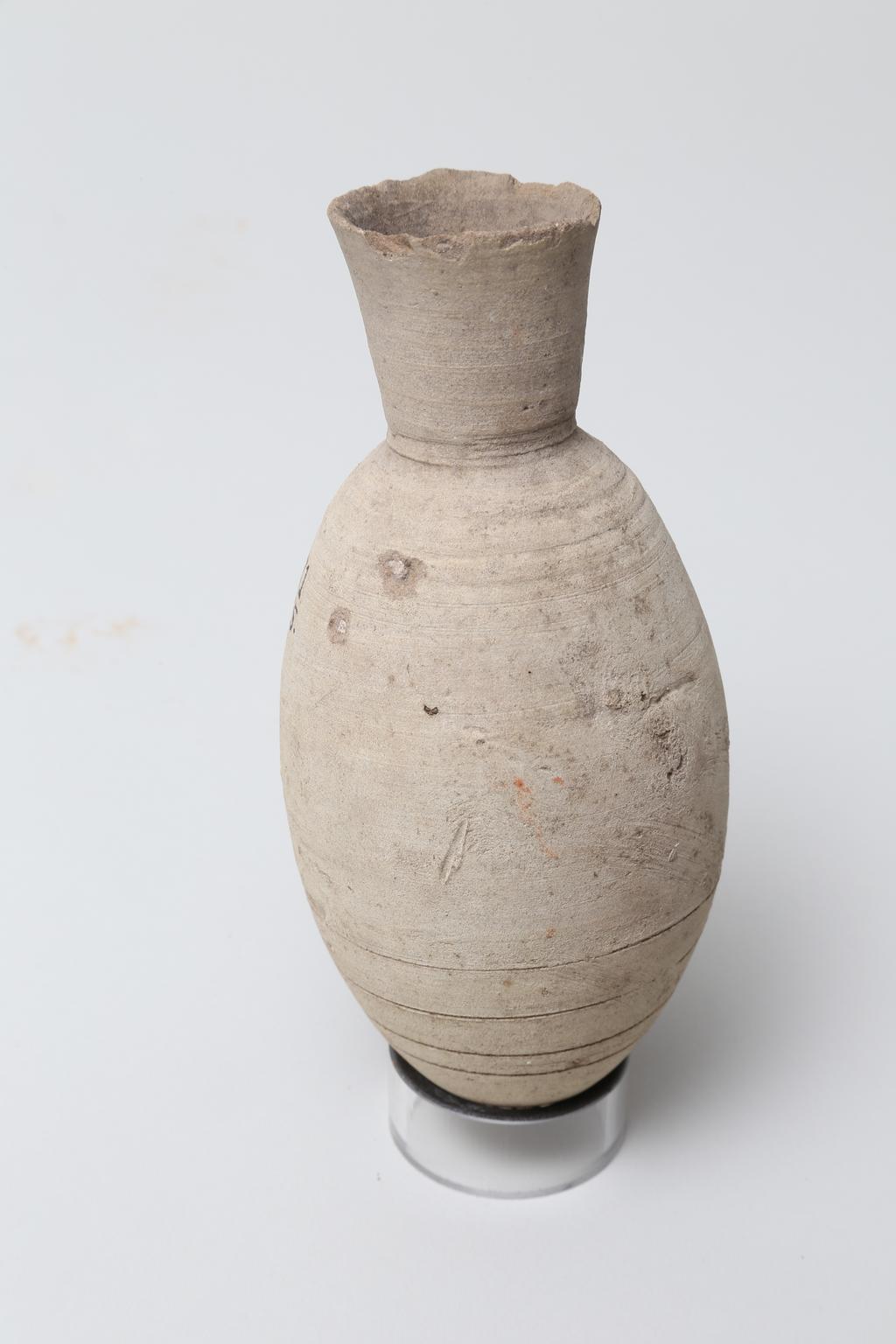 An image of Vessel. Jar, with pointed base. Production Place/Find Spot: Egypt. Height 0.145 m. Eighteenth Dynasty. New Kingdom.