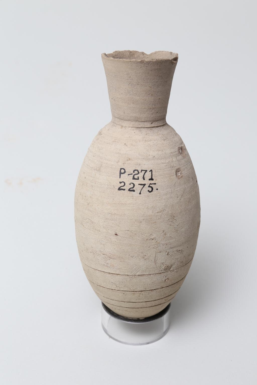 An image of Vessel. Jar, with pointed base. Production Place/Find Spot: Egypt. Height 0.145 m. Eighteenth Dynasty. New Kingdom.